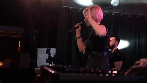 Female singer performs on the stage. Stock Footage 109183855