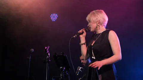 Female singer performs on the stage. Stock Footage 109228545