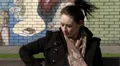 Female sitting alone outside HD Footage