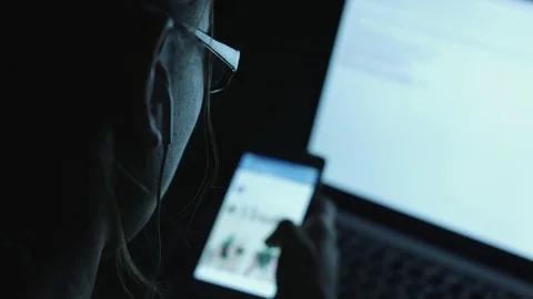 Female sitting by table in evening Stock Footage 70785932