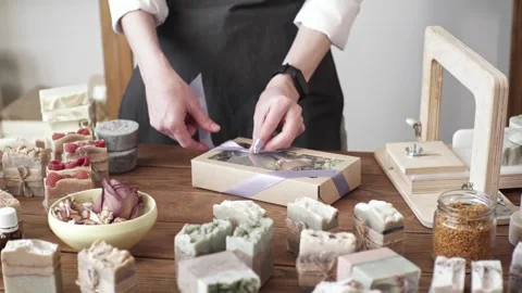 Female soap maker holds handmade soap in her hands Stock Footage 277968280