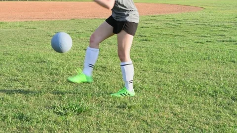 Female soccer player juggling a ball Stock Footage 201746341