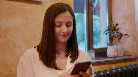 Female socializing while sitting outside office in a cafe. Stock Footage 295808033