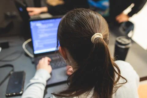 Female software developer students working on computer and laptop, programm.. 스톡 사진