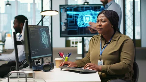 Female software developer using artificial intelligence to optimize performance Stock Footage 313017805