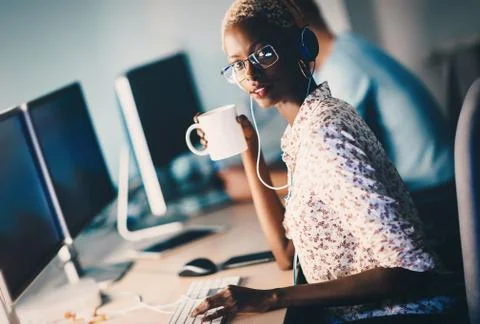 Female software developer working for IT company Stockfoto's