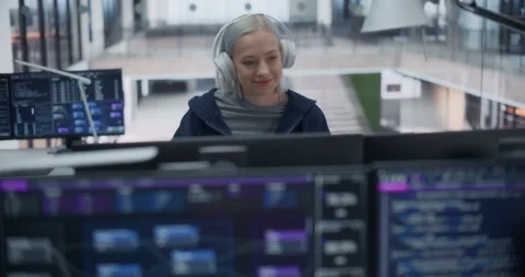 Female Software Developer Working in Office Stock Footage 296182474