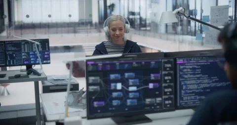 Female Software Developer Working in Office Stock Footage 296182527