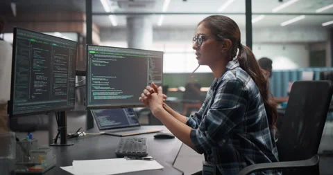 Female Software Developer Working in Office Stock Footage 321011918