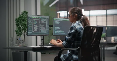 Female Software Developer Working in Office Stock Footage 321012020