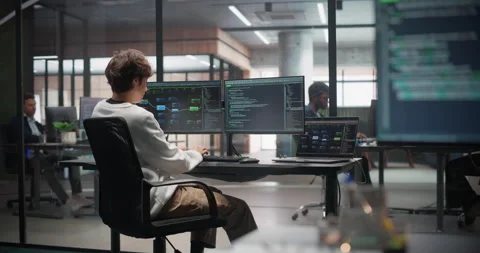 Female Software Developer Working in Office Stock Footage 321012289