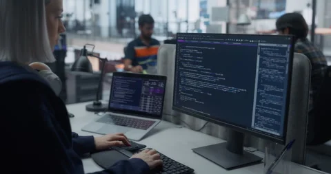 Female Software Developer Writing Code on Computer Stock Footage 296183469