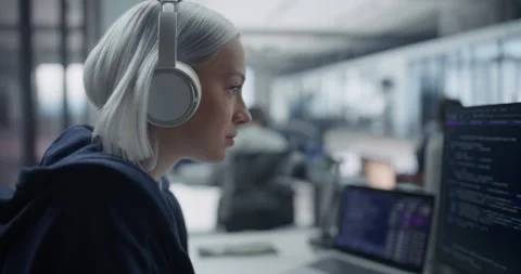 Female Software Developer Writing Code on Computer Stock Footage 296183925