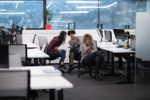 Female software developers using mobile phones 스톡 사진
