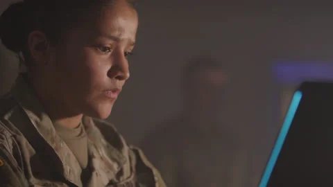 Female Soldier Concentrating on Computer Work Stock Footage 208783056