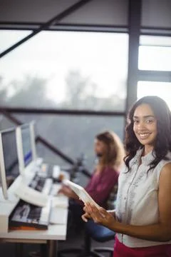 Female sound engineer in studio using digital tablet in studio Stock Photos