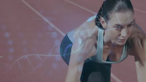 Female sprinter in crouch tensing, shifting on track while helix overlaying Stock Footage 332625533