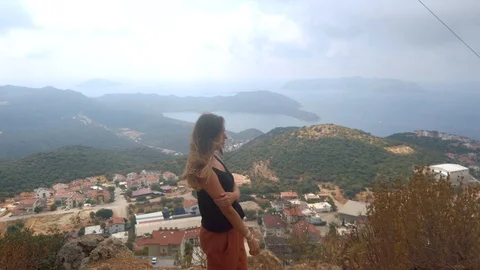 Female standing on observation point Stock Footage 124639014