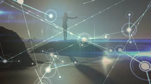 Female standing on rock, node appearing on sand starting network expanding Stock Footage 328384522