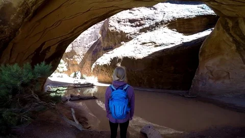 Female stands under arch Video stock 79573718