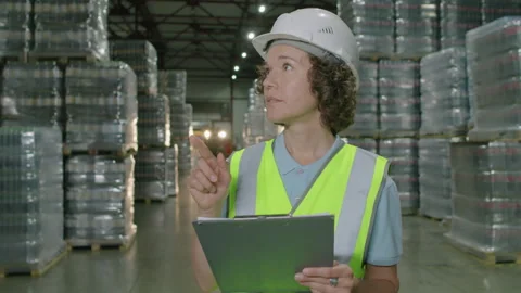Female Storehouse Worker Using Document Stock Footage 259712472