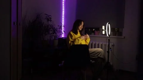 Female streamer with cat talking on camera streaming Stock Footage 316264082