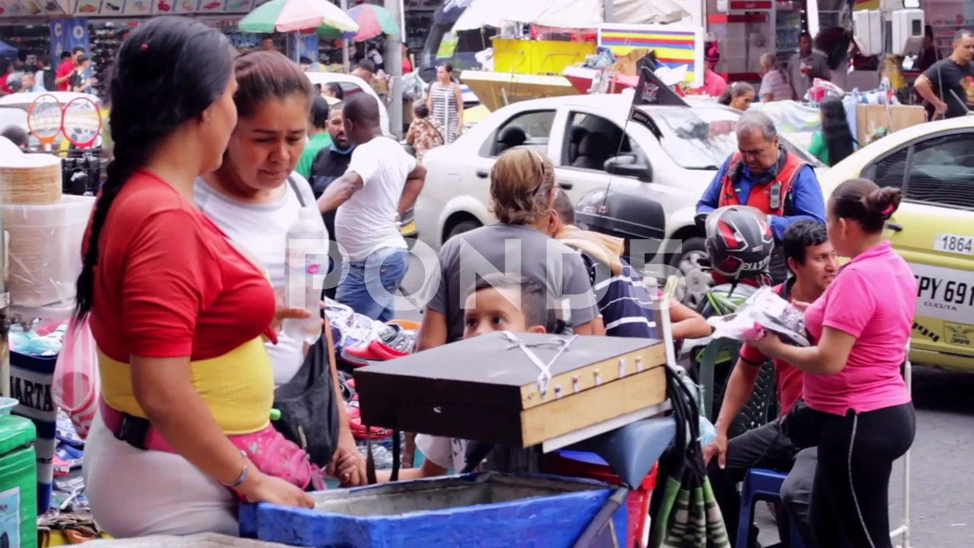 Female Street Vendor Sells Water in Cucuta, Colombia