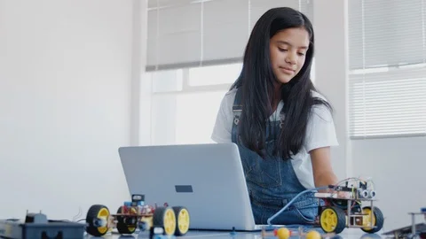 Female Student Building And Programing Robot Vehicle In After School Computer 動画素材 111933529