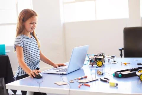 Female Student Building And Programing Robot Vehicle In After School Computer Stock Photos