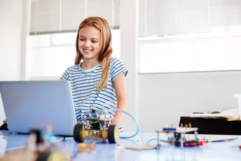 Female Student Building And Programing Robot Vehicle In After School Computer Stock Photos