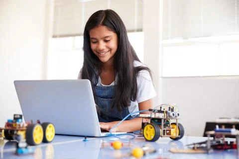 Female Student Building And Programing Robot Vehicle In After School Computer Stock Photos