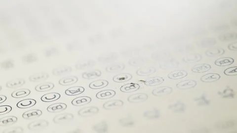 Female Student Correcting Wrong Answer During Exam Learning Process, selecting a Stock Footage 332666709