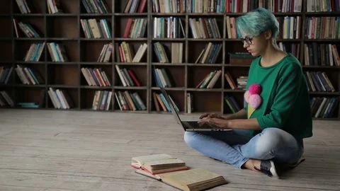 Female student e-learning online with laptop Stock Footage