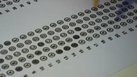 Female student hand testing doing examination test with standardized test Stock Footage 121517623