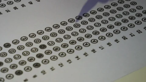 Female student hand testing doing examination test with standardized test Stock Footage 121517668