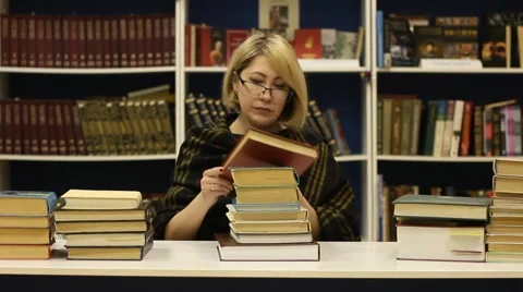 Female student in the library Stock Footage 46042137