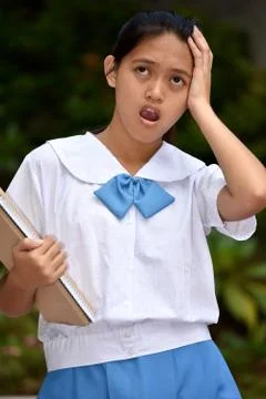 Female Student Memory Problems With School Books 스톡 사진