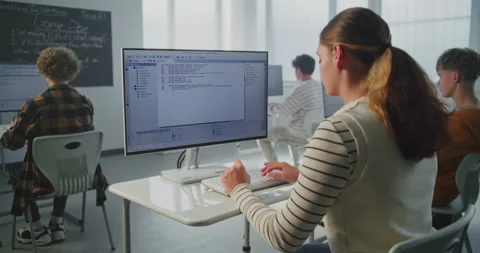 Female Student Performs Practical Coding Task Stock Footage 318525163
