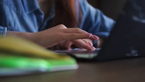 Female student preparing for exam, session, working on laptop at home Stock Footage 152876492