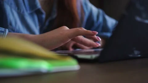 Female student preparing for exam, session, working on laptop at home Stock Footage 152946329