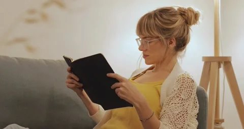 Female student reading notes Stock Footage 143800257