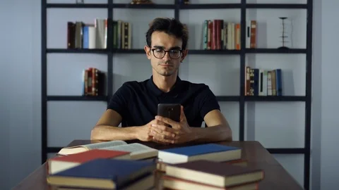 Female student study in library using tablet and searching internet while Stock Footage 93259939