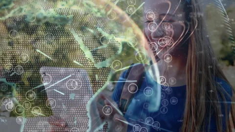 Female student studying educational tech outdoors, interacting with digital Stock Footage 307467196