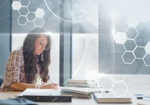 Female Student studying with notes and science education interface graphics Stock Photos