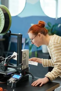 Female Student using 3D Printer in Engineering Class Stock Photos