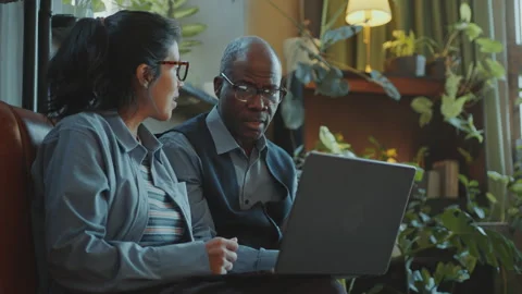 Female Student Using Laptop and Talking with Senior Teacher Stock Footage 274624461