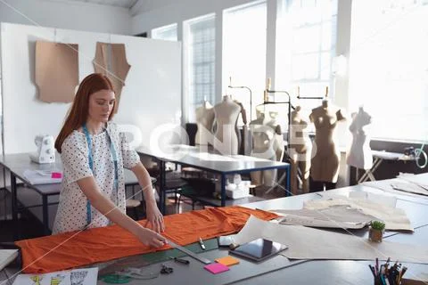 Female student working on a project at a fashion college Stock Photos
