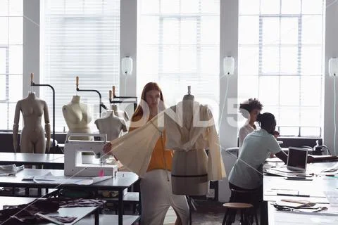 Female student working on a project at a fashion college Stock Photos