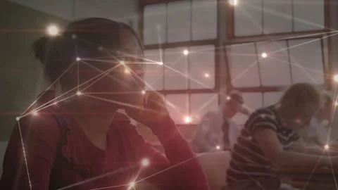 Female student writing notes activating node overlay for education as sunlight Stock Footage 319572773