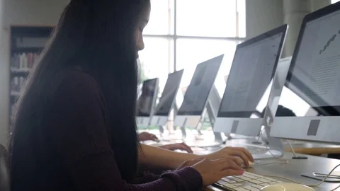 Female students studying with computers Stock Footage 83398671